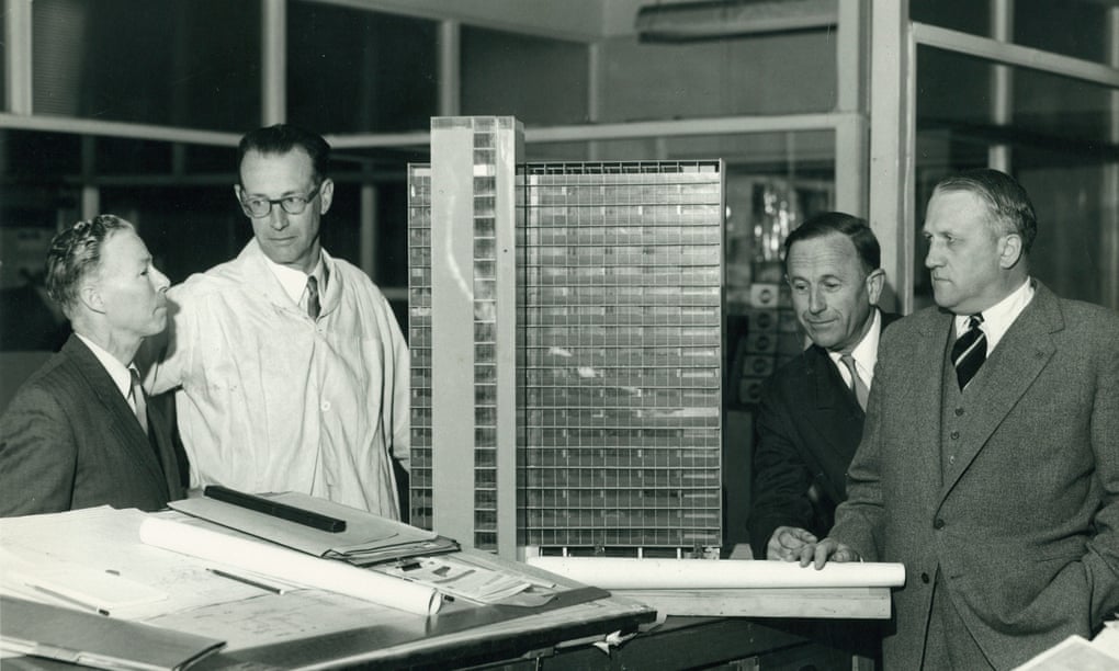 Architect Sir Osborn McCutcheon, second from right, with a model of ICI House